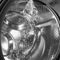 appliance water spraying in washer